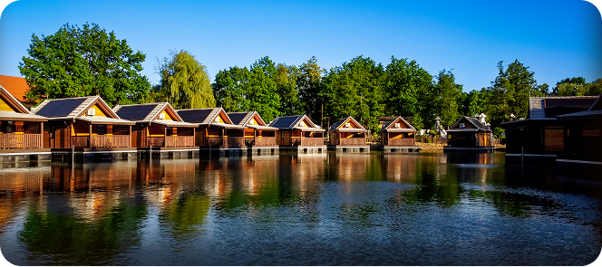 group-girls-sitting-hay-with-horses (1)